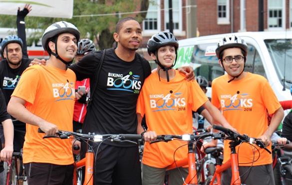 Bryant, second from left, founded Biking4Books in 2013 to help provide textbooks to St. Louis students. Submitted photo